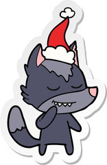 friendly hand drawn sticker cartoon of a wolf wearing santa hat