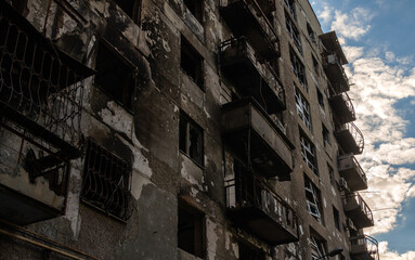 destroyed and burned houses in the city during the war in Ukraine