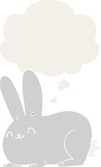 cartoon rabbit with thought bubble in retro style