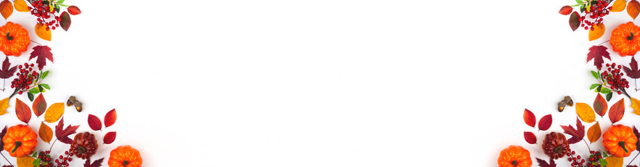 Leaves and pumpkins on a light background, view from above. Design for different purposes.