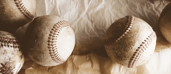 Old texture of used baseball balls from sports game for vintage equipment banner.