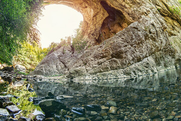 Prerasts of Vratna or Vratna Gates are three natural stone bridges on the Miroc mountain in Serbia