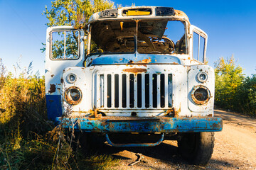 War in Ukraine. 2022 Russian invasion of Ukraine. Countryside. Damaged bus after shelling. Terror of the civilian population. war crime