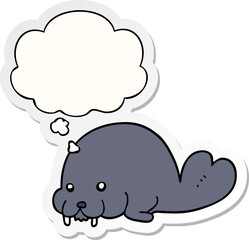 cute cartoon walrus with thought bubble as a printed sticker