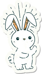 worn old sticker of a tattoo style cute bunny