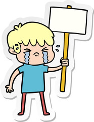 sticker of a cartoon boy crying
