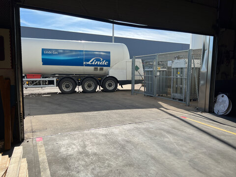 SORIA, SPAIN - APRIL 5, 2022: Linde gas truck unloading gas in a factory.