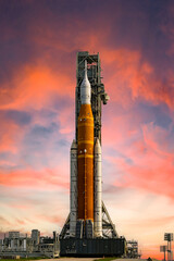 Orion spaceship on dramatic sky background. Mission to the Moon. Artemis space program to research solar system. Elements of this image furnished by NASA.