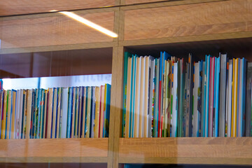 wooden bookcase filled with books