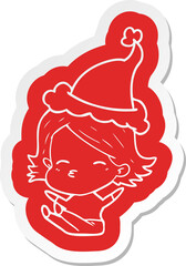 quirky cartoon  sticker of a woman sitting wearing santa hat