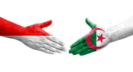 Handshake between Algeria and Indonesia flags painted on hands, isolated transparent image.
