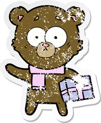 distressed sticker of a nervous christmas bear cartoon
