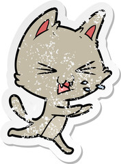 distressed sticker of a cartoon cat hissing