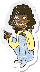 retro distressed sticker of a cartoon happy woman sitting and pointing
