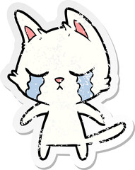 distressed sticker of a crying cartoon cat