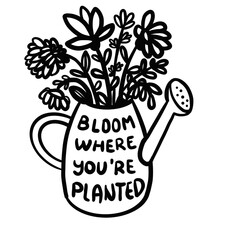 watering can with flowers