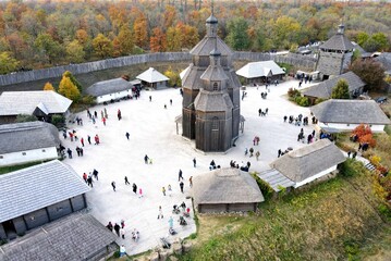 Ukraine Zaporizhzhia Cossacks. Old wooden vintage church and fortress stand on Khortytsya island, in Ukrainian city Zaporozhye. Defender Day, Feast of Intercession of Virgin.