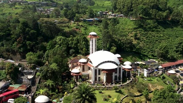 Aerial view of The Largest Mosque Atta'awun Puncak, Ramadan Eid Concept background, Travel and tourism.