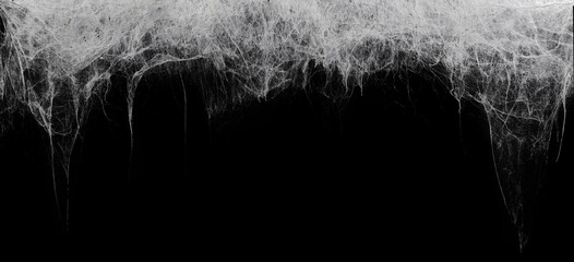 Creepy hanging spider web or cobweb on black, top border. Spooky Halloween or gothic background. - 537660390