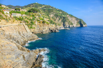 Fototapeta na wymiar Monterosso al mare idyllic beach, Cinque Terre cliffs, Liguria, Italy