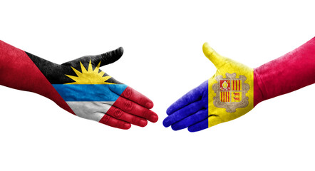Handshake between Andorra and Antigua Barbuda flags painted on hands, isolated transparent image.