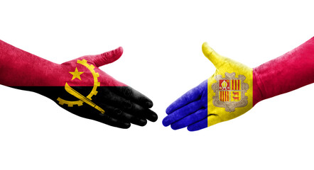 Handshake between Andorra and Angola flags painted on hands, isolated transparent image.