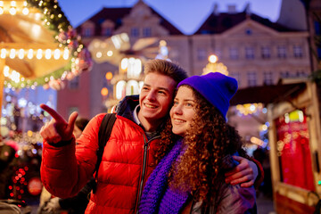 Young couple on Christmas market in Wroclaw, Poland