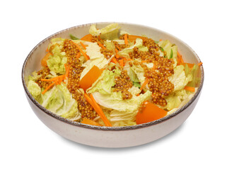 Delicious salad with Chinese cabbage and mustard seed dressing isolated on white