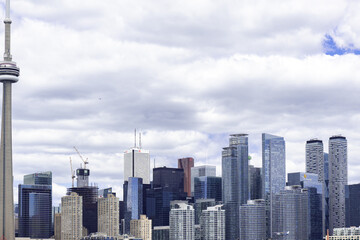 Fototapeta premium Toronto, Canada - May 28 2022: Toronto skyline with modern tall financial buildings in the background. Skyscrapers in Toronto