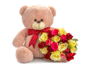 pink teddy bear with a red bow and a bouquet of beautiful roses. gift concept on white background