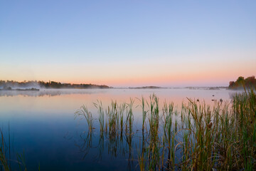 Fototapeta na wymiar Picturesque Williamstown lake at misty dawn Lakeville New Brunswick Canada