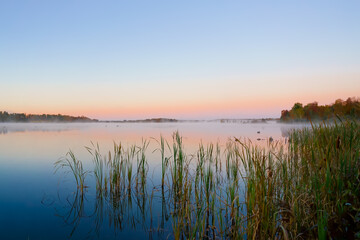 Fototapeta na wymiar Picturesque Williamstown lake at misty dawn Lakeville New Brunswick Canada