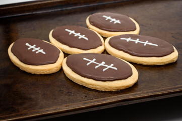 Obraz na płótnie Canvas Super Bowl party cookies. American Football shape cookies. Home made cookies