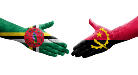 Handshake between Angola and Dominica flags painted on hands, isolated transparent image.