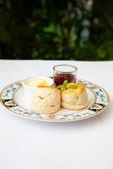 Butter scone set with raspberry and clotted cream