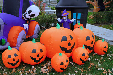 Inflatable Halloween decorations in front yard of home