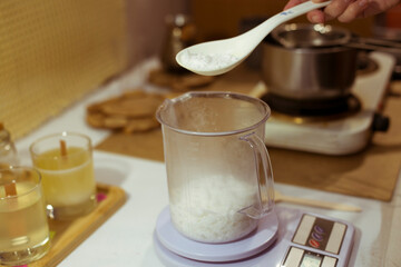 the process of making a candle. Eco-soy wax. A candle with your own hands. Hobby concept . Craft hobby, small business