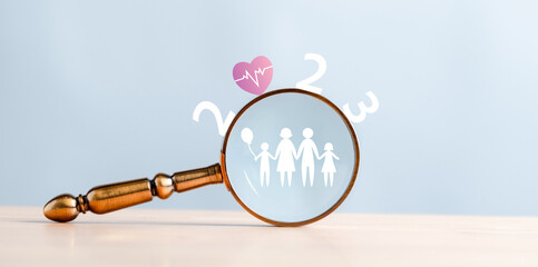 Happiness family on 2023 year concept. Magnifier focus to family icon. happy to next year from end...