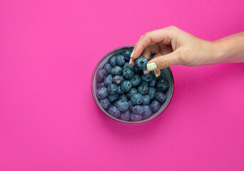 Blueberries on color background
