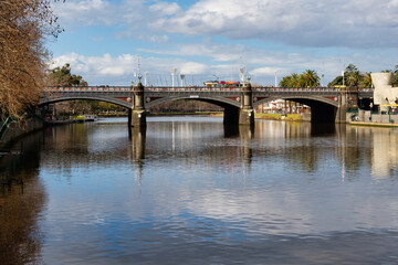 Fototapeta na wymiar Princes Bridge, the grandest and oldest bridge of Melbourne, was styled on the Blackfriars Bridge of London - Melbourne, Victoria, Australia