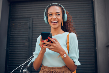 Black woman, smile and phone for social media in the city with headphones in joy for 5G connection in the outdoors. Happy African female student smiling for technology or internet on smartphone