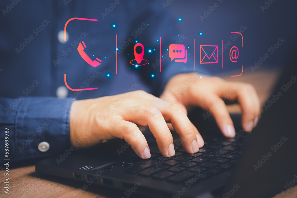 Poster Man using a computer laptop and touching on technology virtual screen contact icons ( phone, email, address, live chat, map ). Contact us or Customer support hotline people connect.