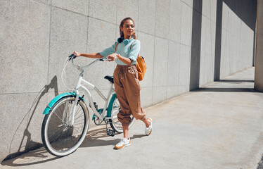 Bike, young city woman and use bicycle on a summer day outdoor with trendy fashion, edgy or casual look. Girl relax, riding and lower carbon footprint for sustainability or eco friendly transport