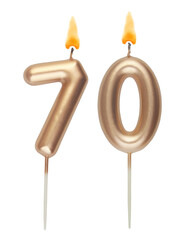 Burning gold birthday candles isolated on white, number seventy