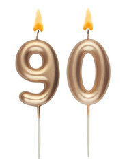 Burning gold birthday candles isolated on white, number ninety