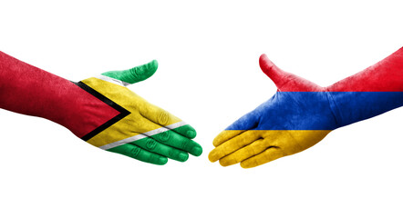 Handshake between Armenia and Guyana flags painted on hands, isolated transparent image.
