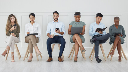 Business people, diversity and waiting room in networking or social media at the office with technology in the workplace. Diverse group of creative workers for interview, line and company recruitment - Powered by Adobe