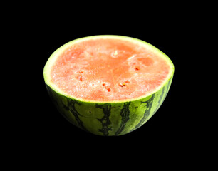 Watermelon slice isolated on black background