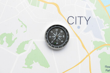 Vintage compass on city map