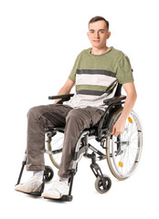 Obraz premium Young man in wheelchair isolated on white